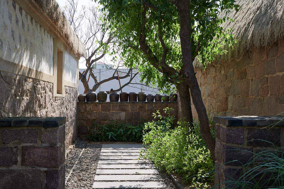 reconstruction design of seaweed bay health resort china by greyspace architects