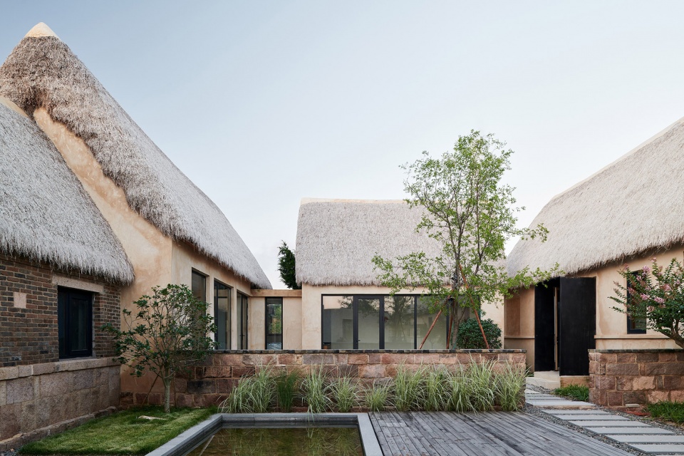reconstruction design of seaweed bay health resort china by greyspace architects