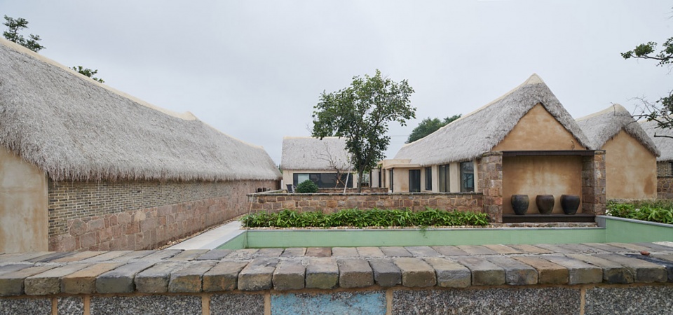 reconstruction design of seaweed bay health resort china by greyspace architects