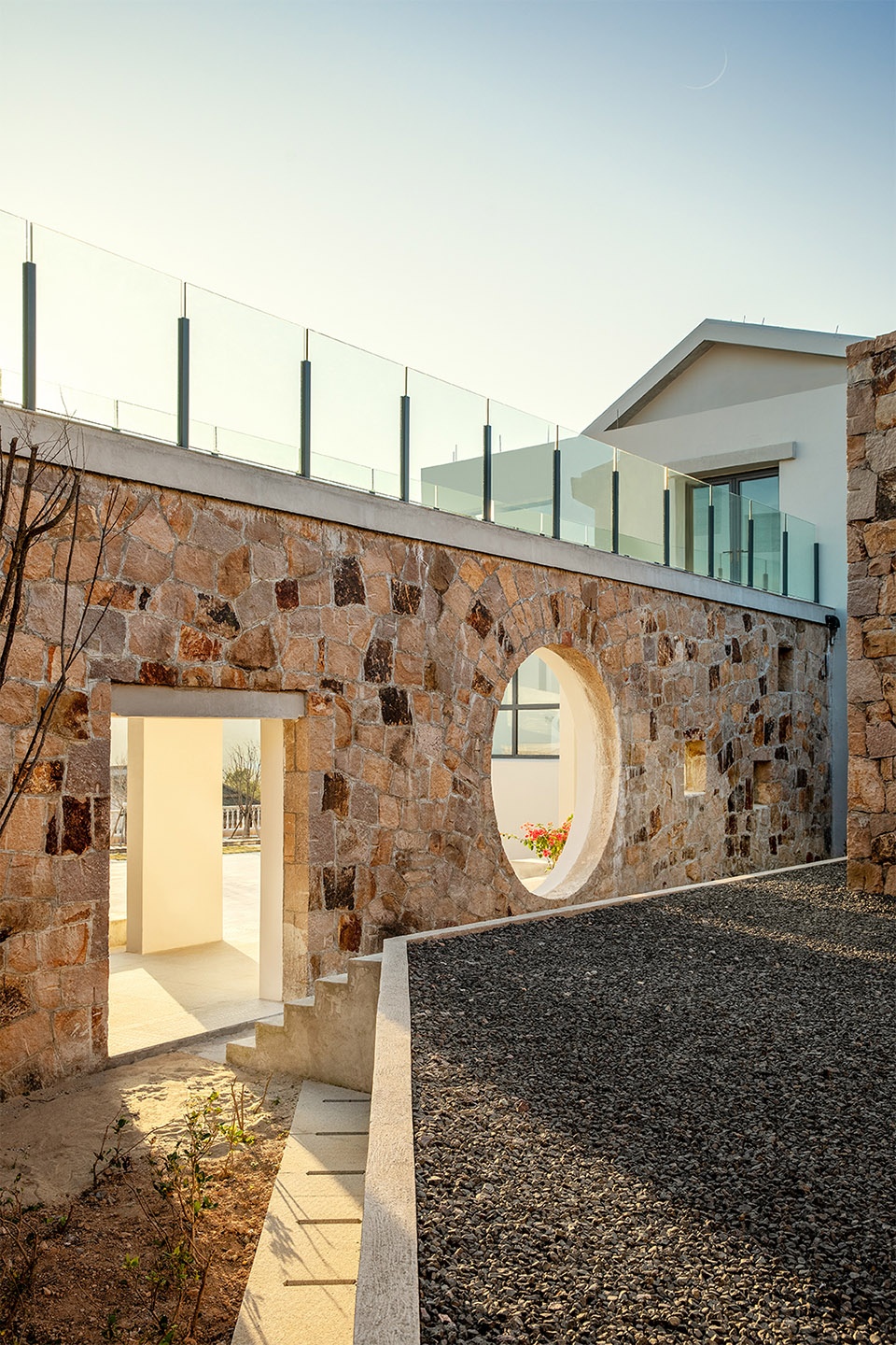 石屋建筑 用曲线的元素塑造出竖向流动的质感