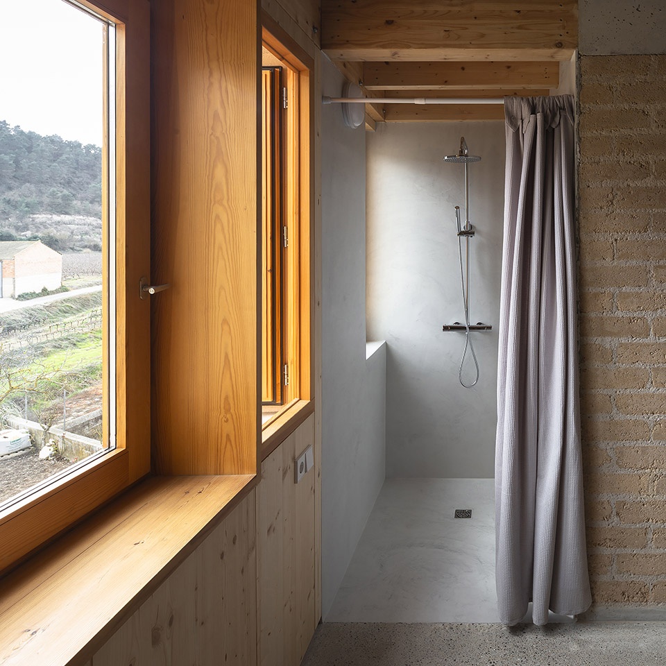 conversion of agricultural warehouse to senior cohousing spain by arqbag