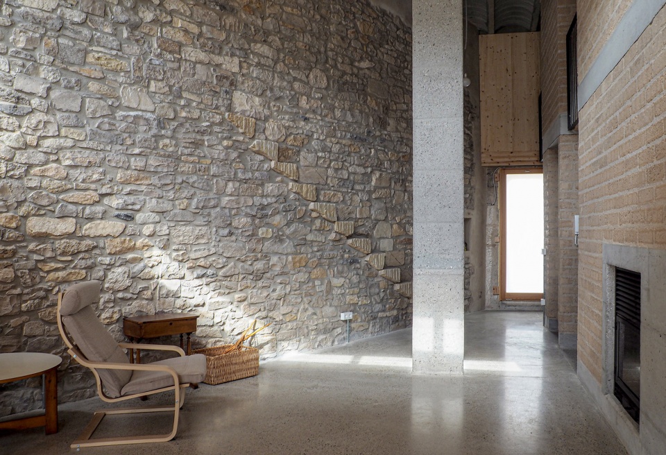 conversion of agricultural warehouse to senior cohousing spain by arqbag