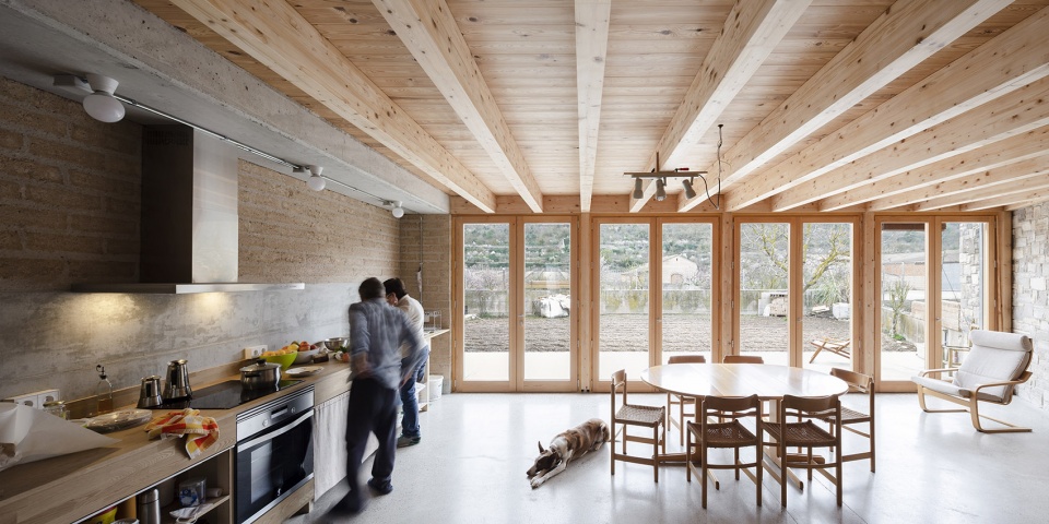 conversion of agricultural warehouse to senior cohousing spain by arqbag
