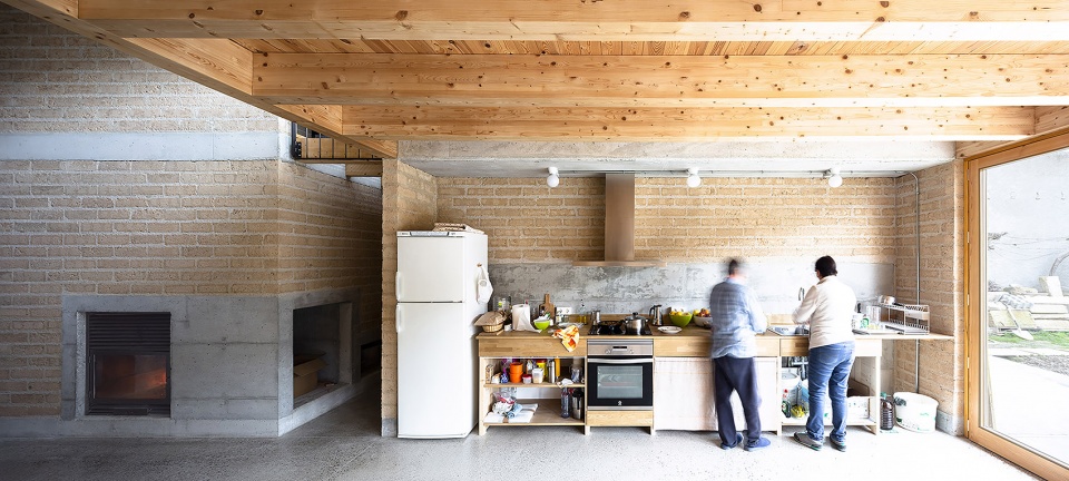 conversion of agricultural warehouse to senior cohousing spain by arqbag