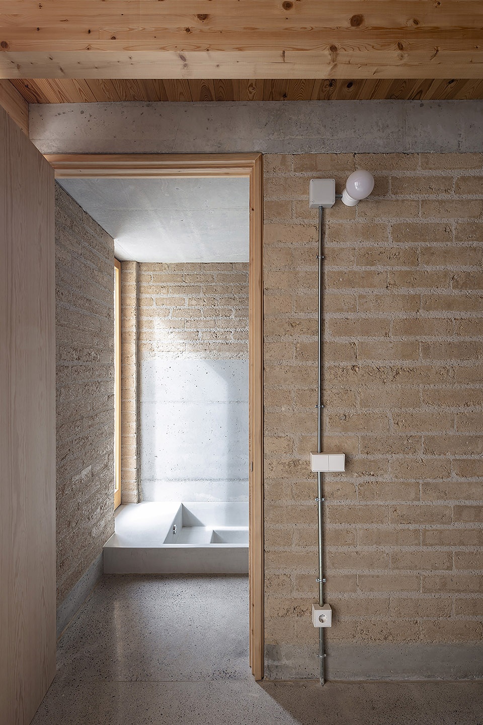 conversion of agricultural warehouse to senior cohousing spain by arqbag