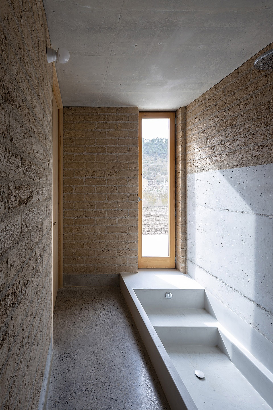 conversion of agricultural warehouse to senior cohousing spain by arqbag