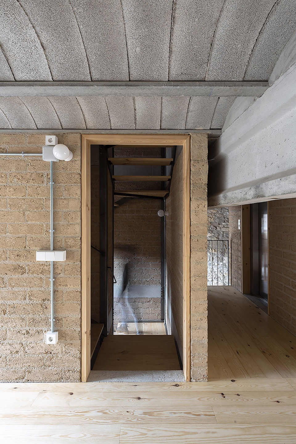 conversion of agricultural warehouse to senior cohousing spain by arqbag