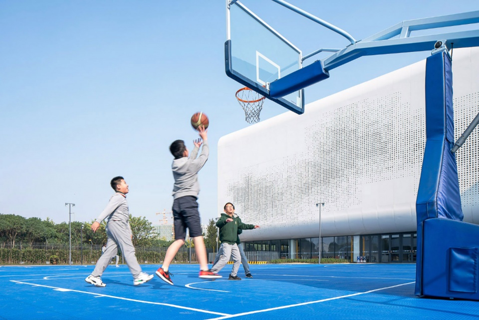 Shanghai Qingpu Pinghe Sports Center China by OPEN Architecture