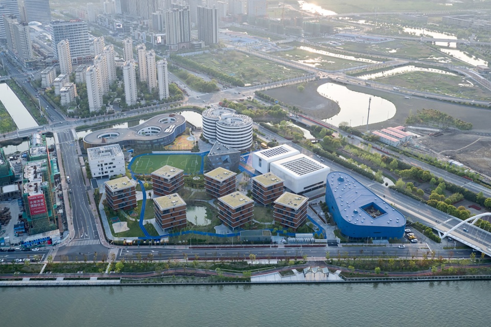 Shanghai Qingpu Pinghe Sports Center China by OPEN Architecture