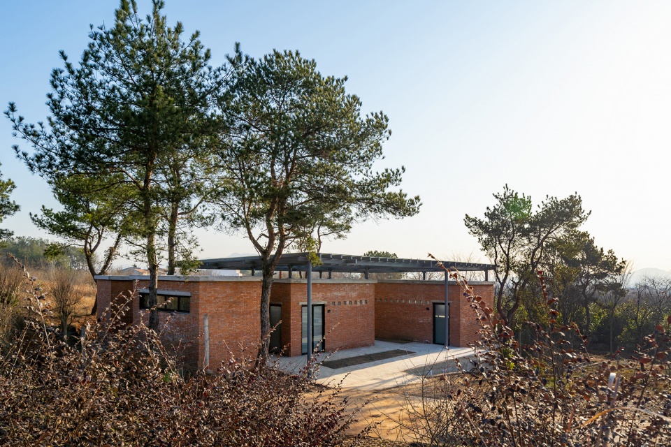 the courtyard memory of miniature architecture design of public toilet of a hundred square meter for rural tourism in wuhan china by uao...