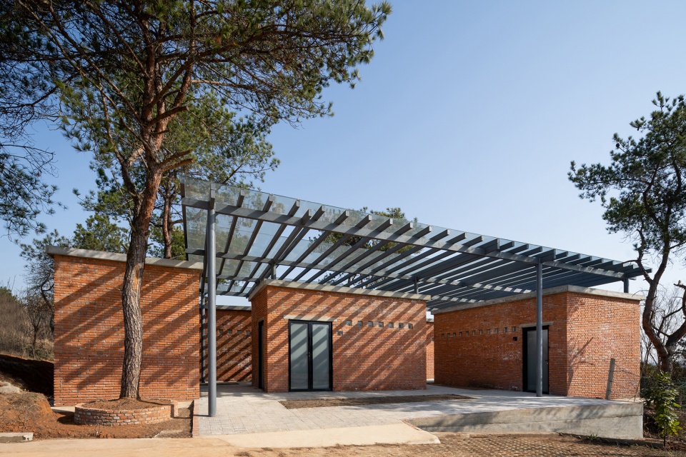 the courtyard memory of miniature architecture design of public toilet of a hundred square meter for rural tourism in wuhan china by uao...