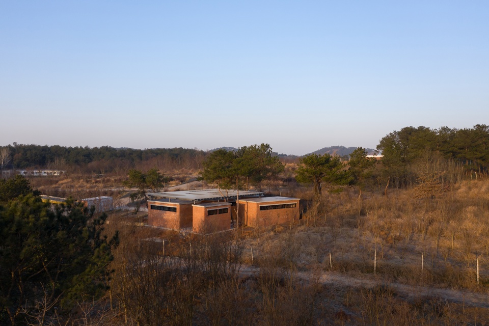 the courtyard memory of miniature architecture design of public toilet of a hundred square meter for rural tourism in wuhan china by uao...
