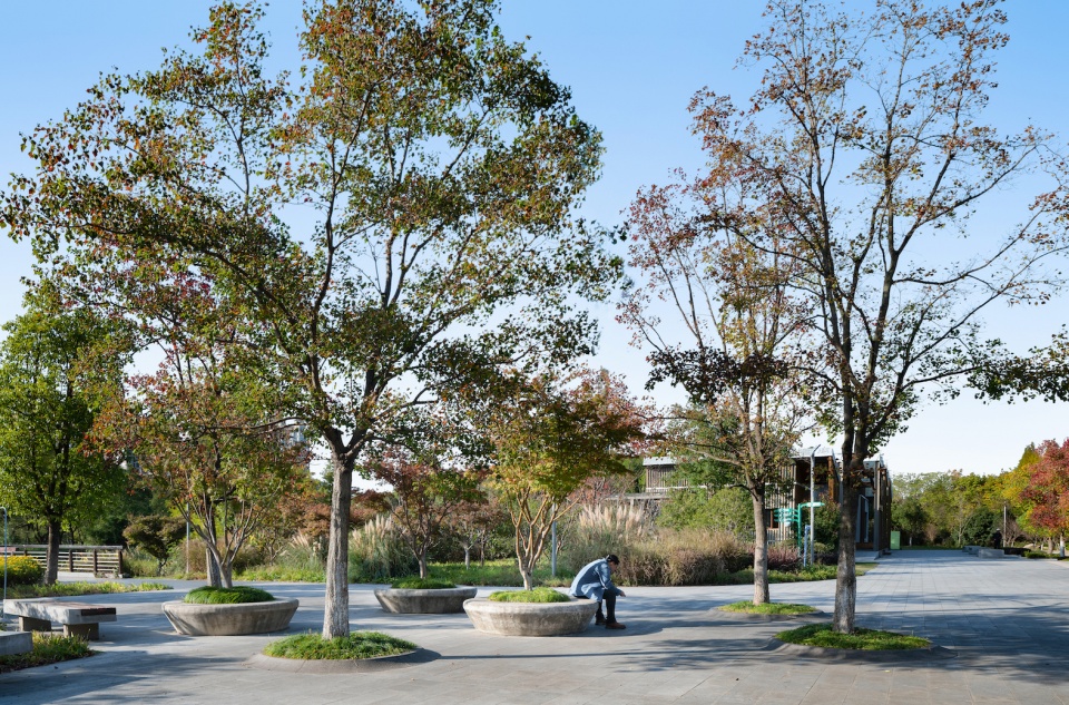 forest park west entry breaking barriers to connect neighborhood landscape infrastructure china by plat studio