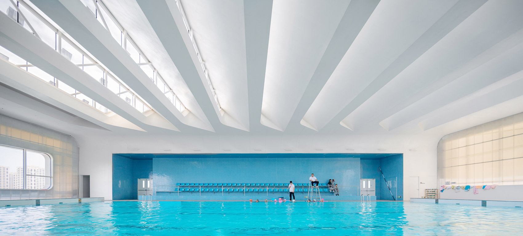 Shanghai Qingpu Pinghe Sports Center China by OPEN Architecture