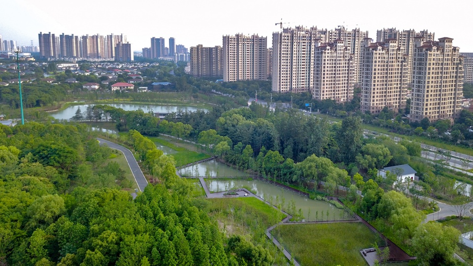 forest park west entry breaking barriers to connect neighborhood landscape infrastructure china by plat studio