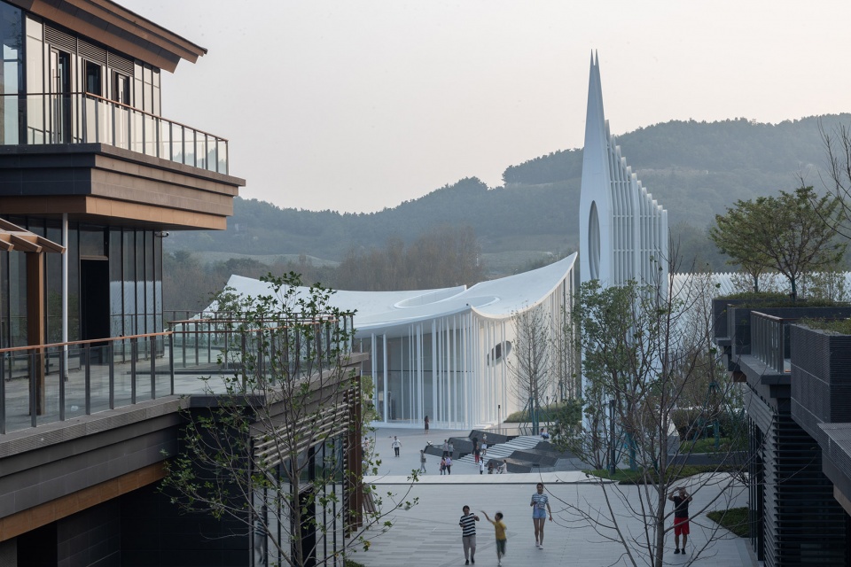 cang ma mountain flying carpet qingdao atour town parent kid centre china by gn architects