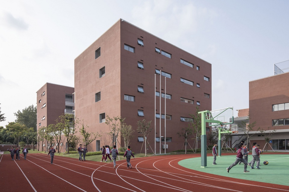 the huafa road south campus of shanghai xuhui high school china by atelier deshaus