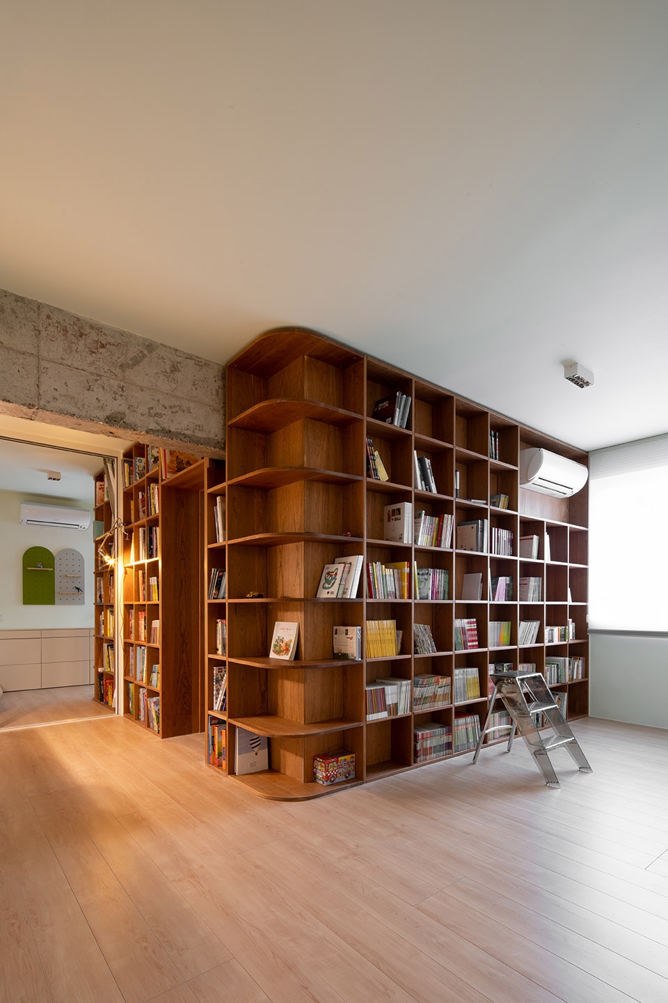 A center core surrounded by bookcases China by Atelier D Y