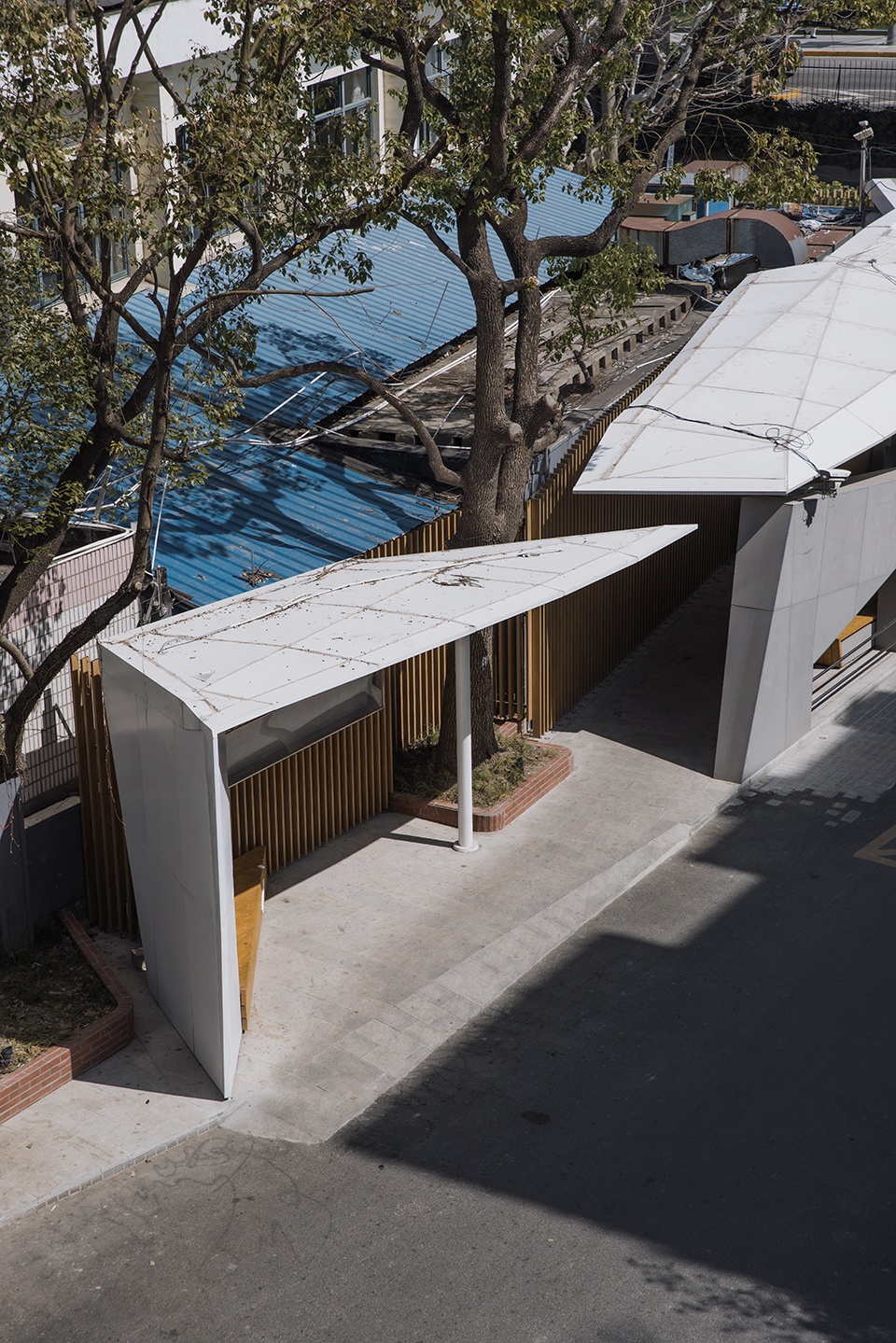 white tangram micro renovation of east china formal university no 1 village residential quarter entrance china by atelier diameter