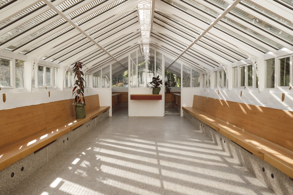 horticultural greenhouse converted into hospitality room by forme architecture urbanisme