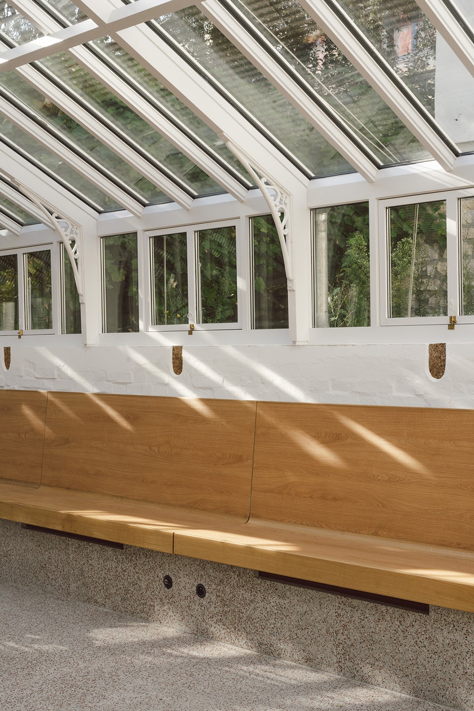 horticultural greenhouse converted into hospitality room by forme architecture urbanisme