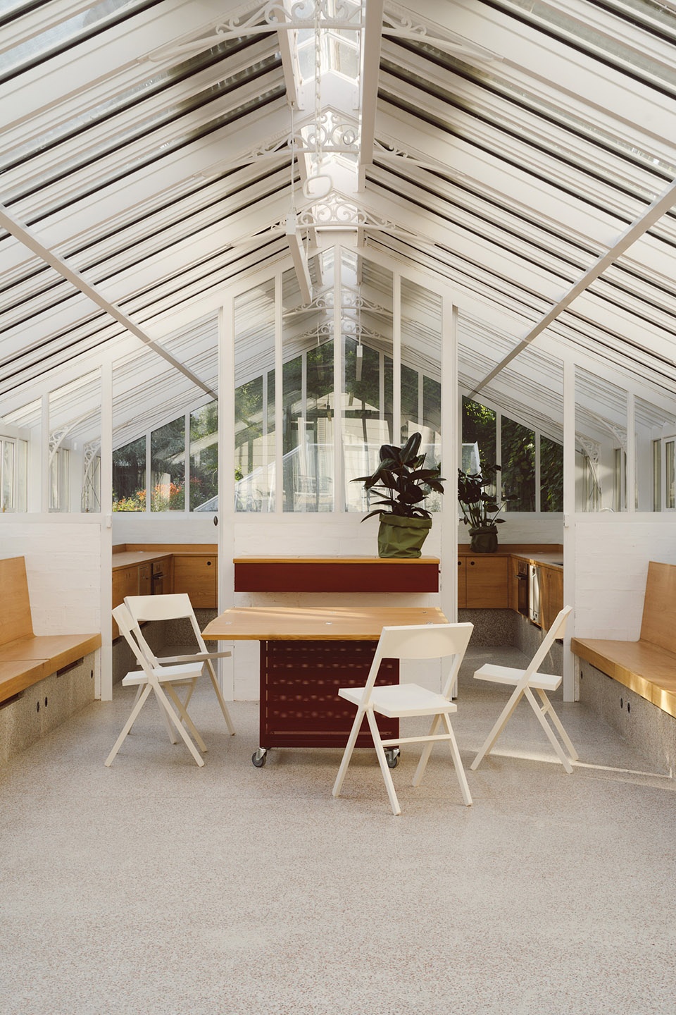 horticultural greenhouse converted into hospitality room by forme architecture urbanisme