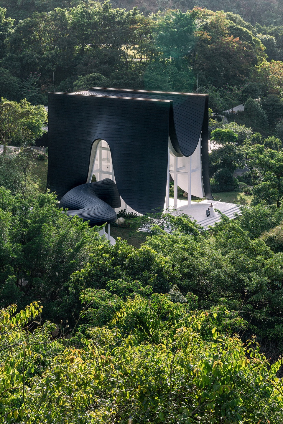the levitated curtain xi hall by say architects