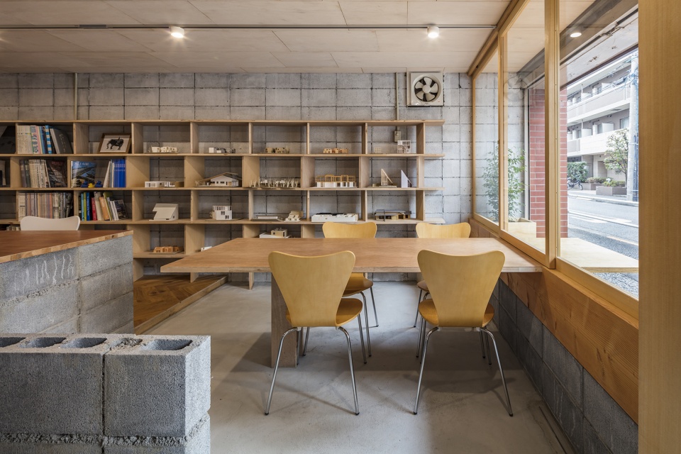 architect office nestle to the town by dog satoshi takae