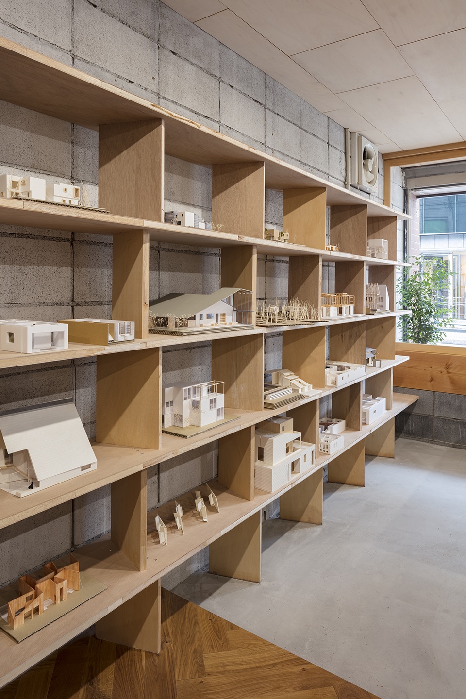 architect office nestle to the town by dog satoshi takae