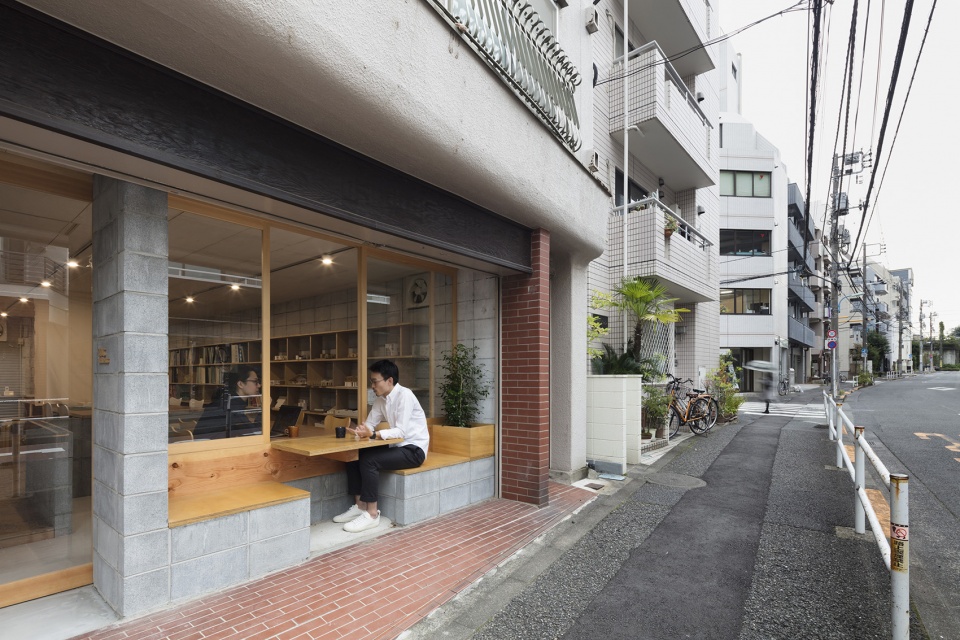architect office nestle to the town by dog satoshi takae
