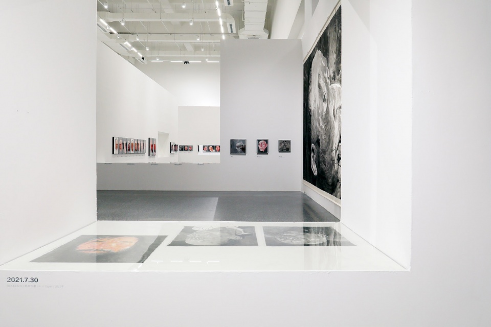 exhibition design of wonderland fang lijun ink painting by swallowtail design