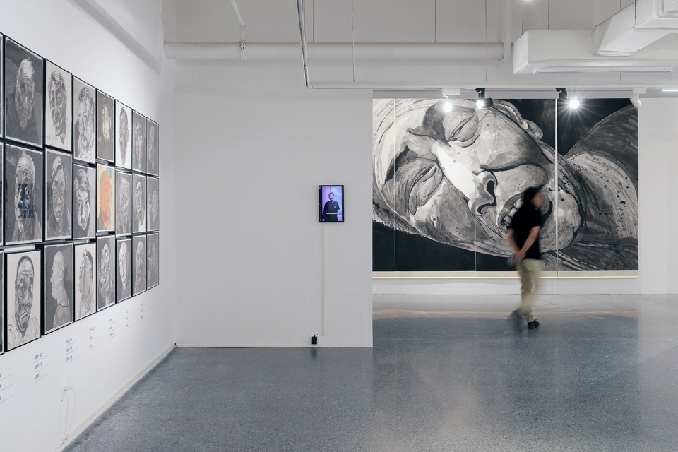 exhibition design of wonderland fang lijun ink painting by swallowtail design