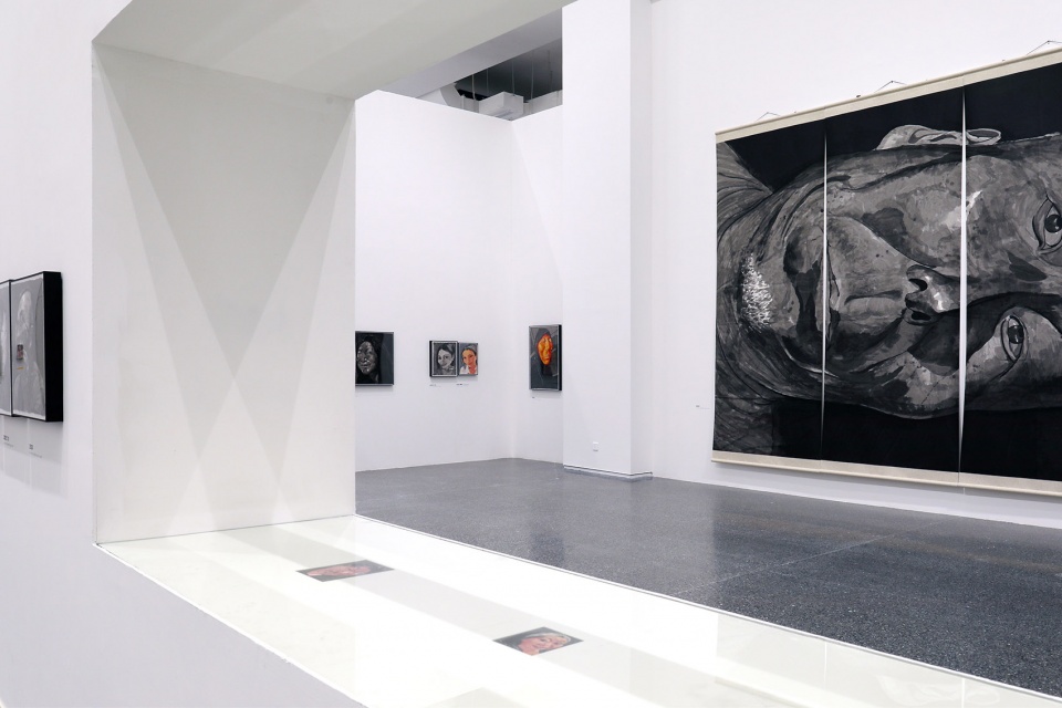 exhibition design of wonderland fang lijun ink painting by swallowtail design