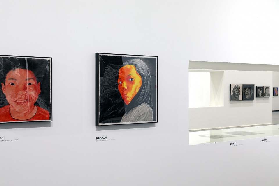 exhibition design of wonderland fang lijun ink painting by swallowtail design