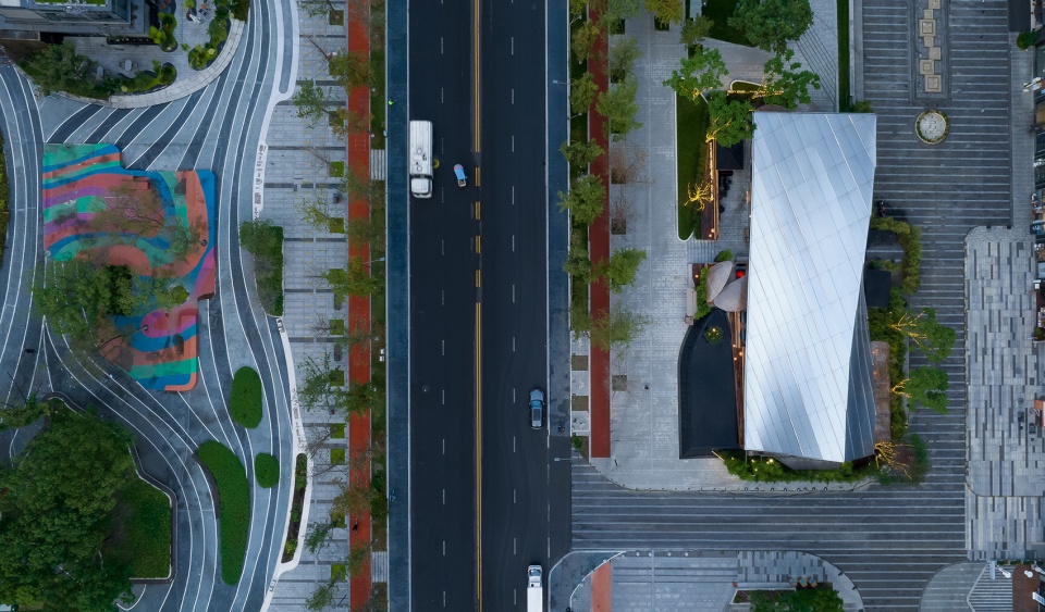Timber Roofed Restaurant on Jiaozi Avenue China by BEHIVE Architects