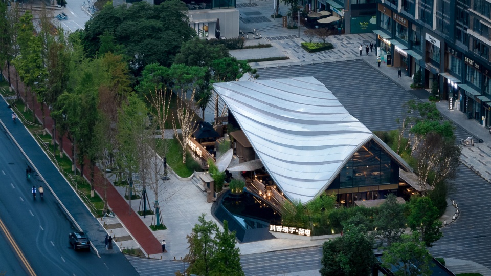 Timber Roofed Restaurant on Jiaozi Avenue China by BEHIVE Architects