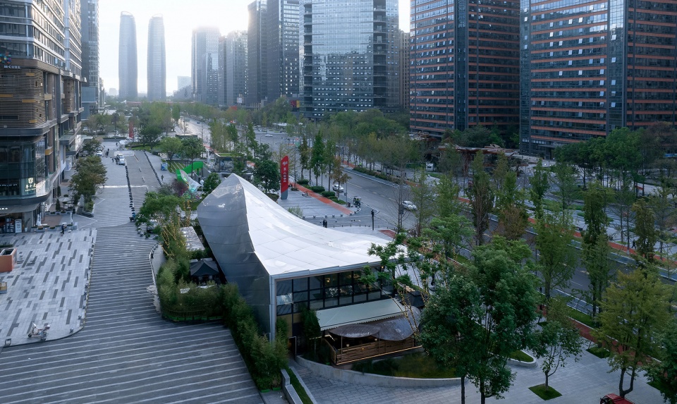 Timber Roofed Restaurant on Jiaozi Avenue China by BEHIVE Architects