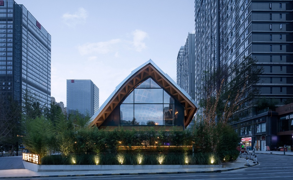 Timber Roofed Restaurant on Jiaozi Avenue China by BEHIVE Architects