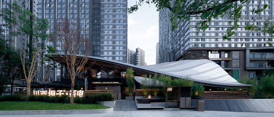 Timber Roofed Restaurant on Jiaozi Avenue China by BEHIVE Architects