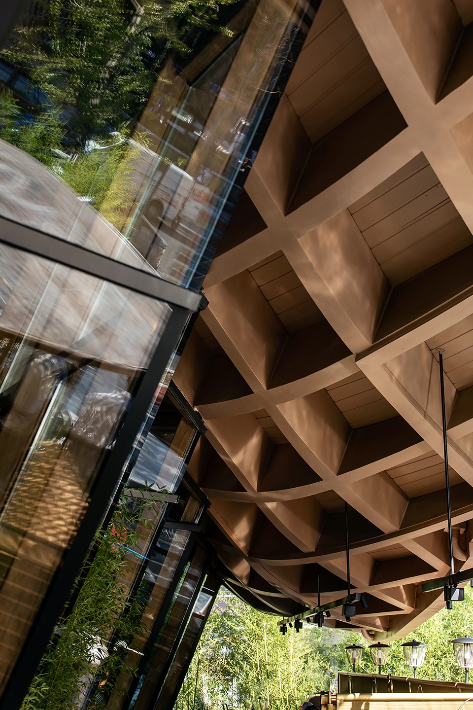Timber Roofed Restaurant on Jiaozi Avenue China by BEHIVE Architects