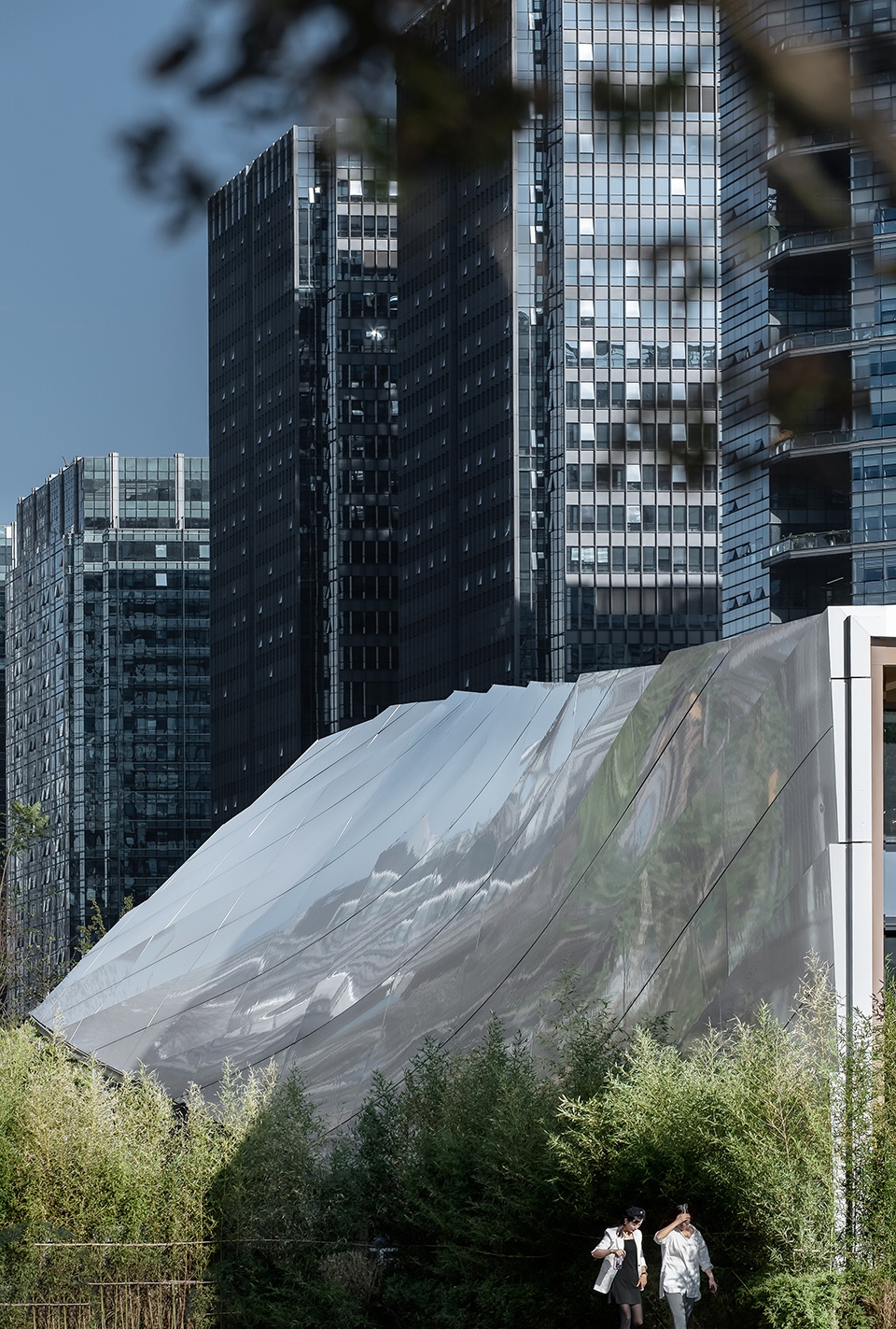 Timber Roofed Restaurant on Jiaozi Avenue China by BEHIVE Architects