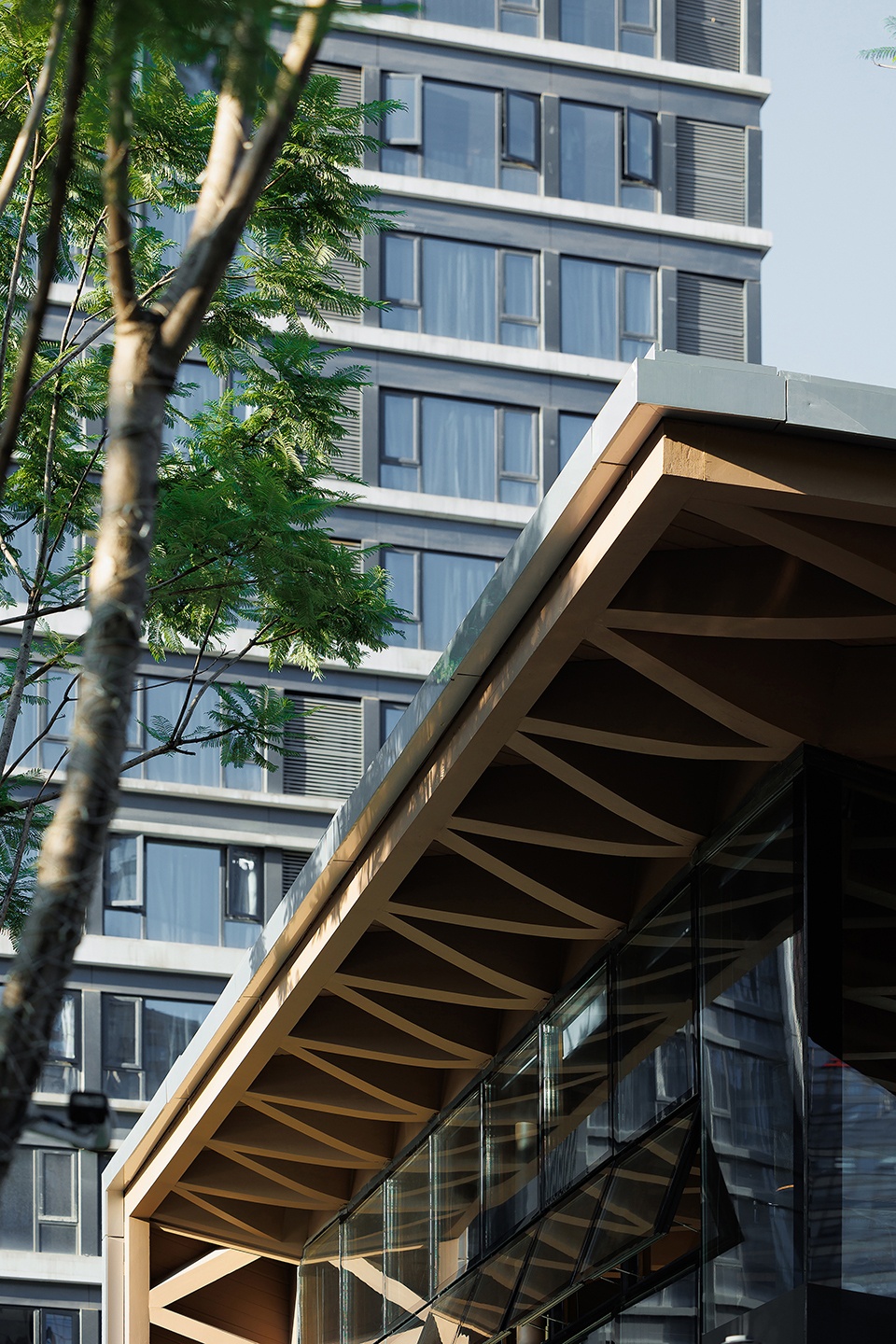 Timber Roofed Restaurant on Jiaozi Avenue China by BEHIVE Architects