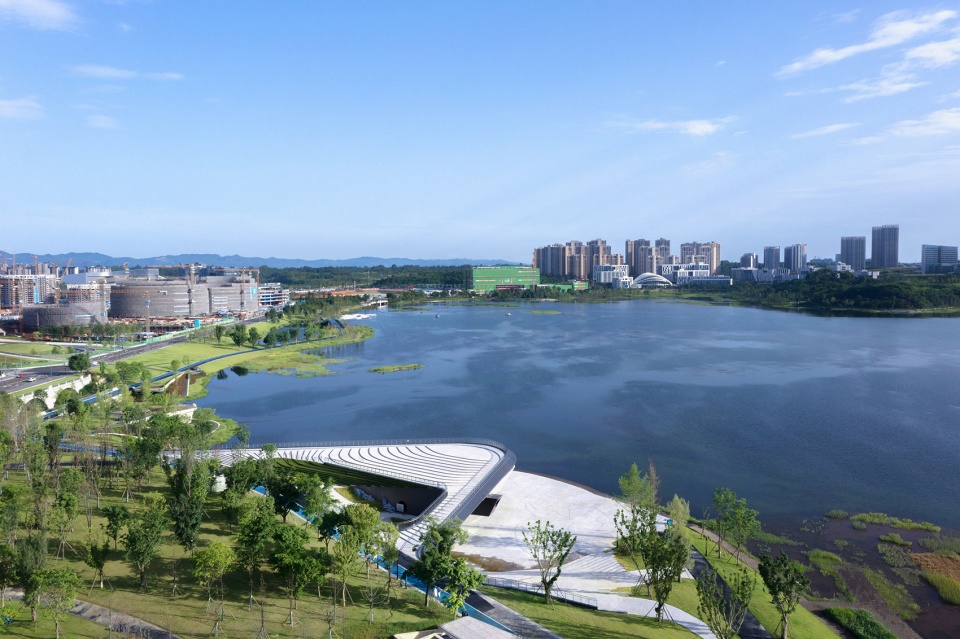 xinglong lake roadshow center by tektonn architects