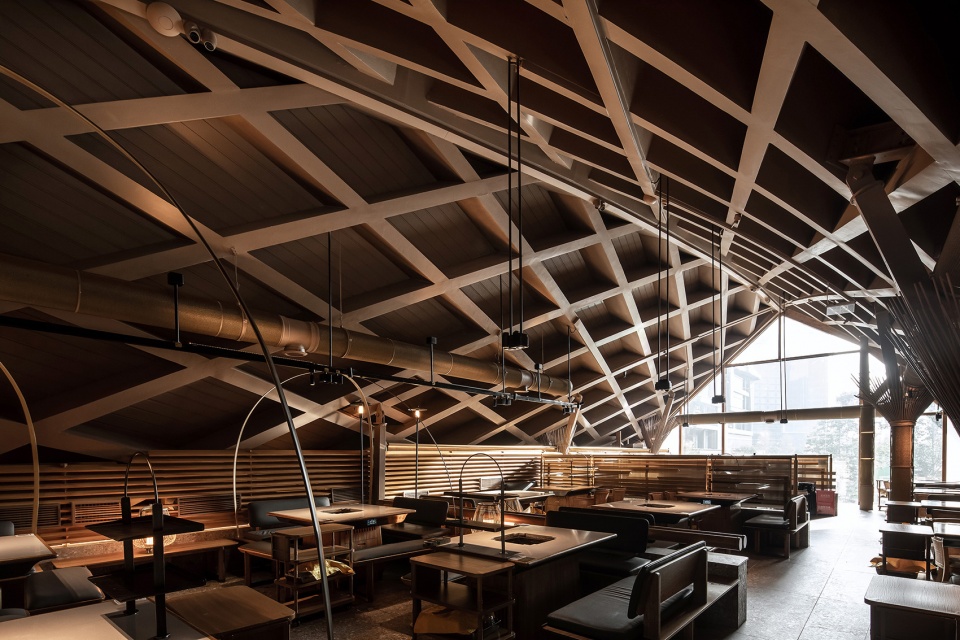 Timber Roofed Restaurant on Jiaozi Avenue China by BEHIVE Architects