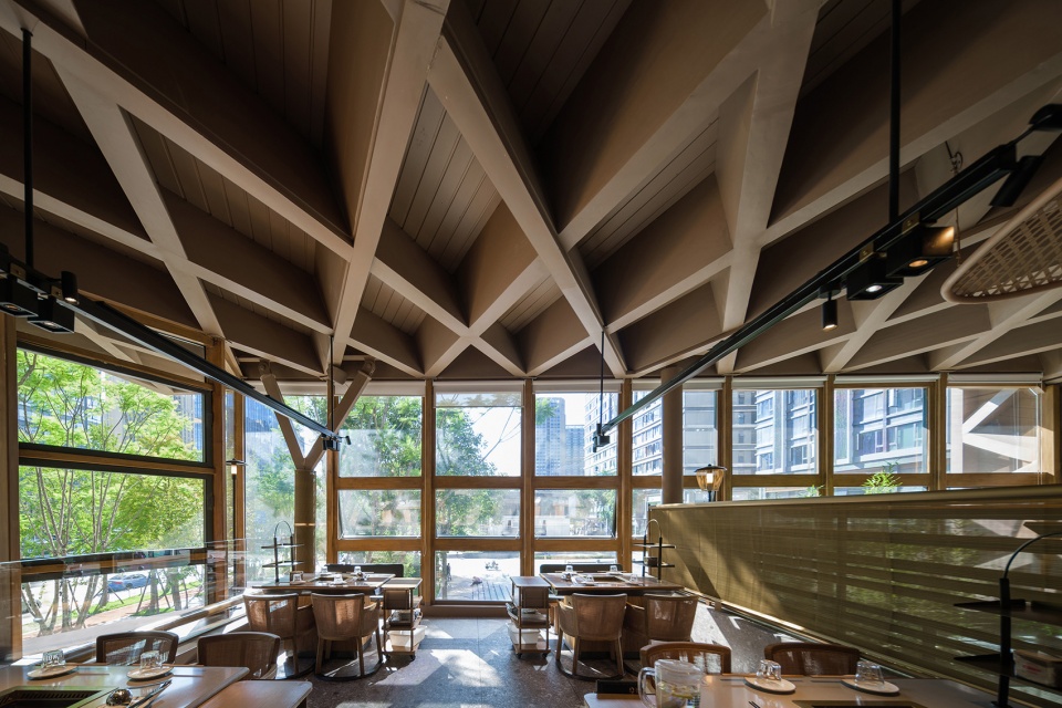 Timber Roofed Restaurant on Jiaozi Avenue China by BEHIVE Architects