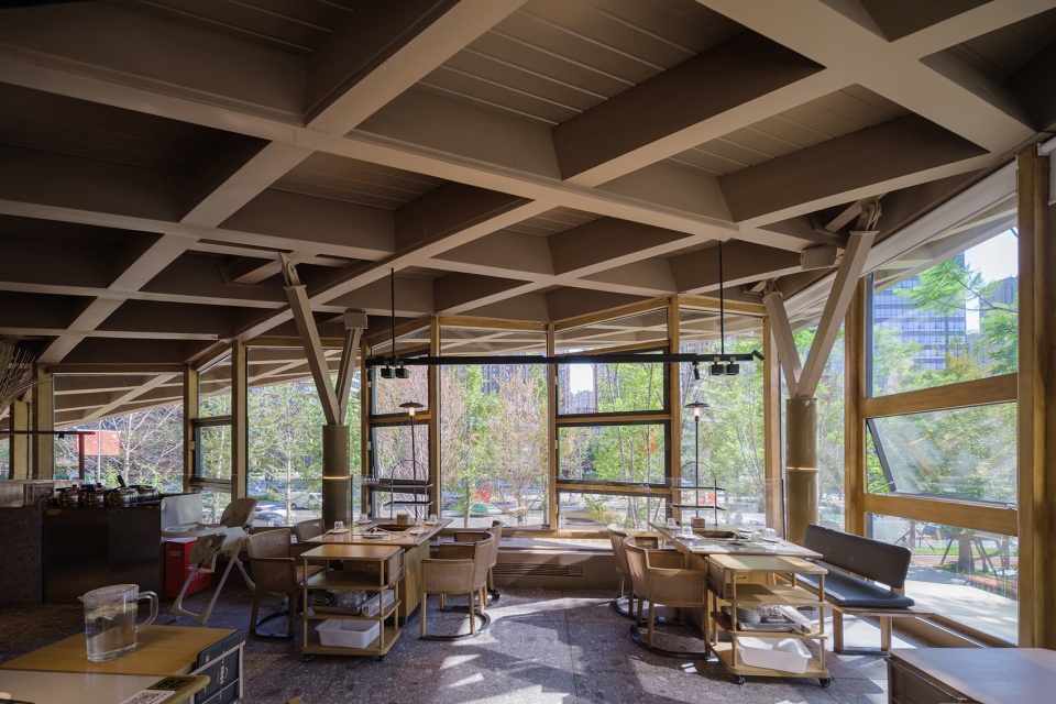 Timber Roofed Restaurant on Jiaozi Avenue China by BEHIVE Architects