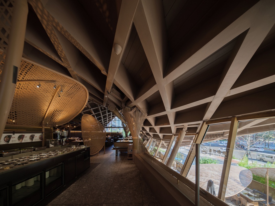 Timber Roofed Restaurant on Jiaozi Avenue China by BEHIVE Architects