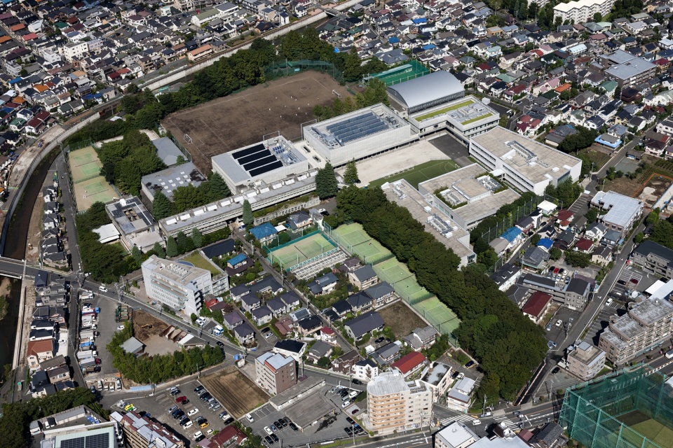 Waseda University Senior High School Auditorium by Nikken Sekkei Ltd