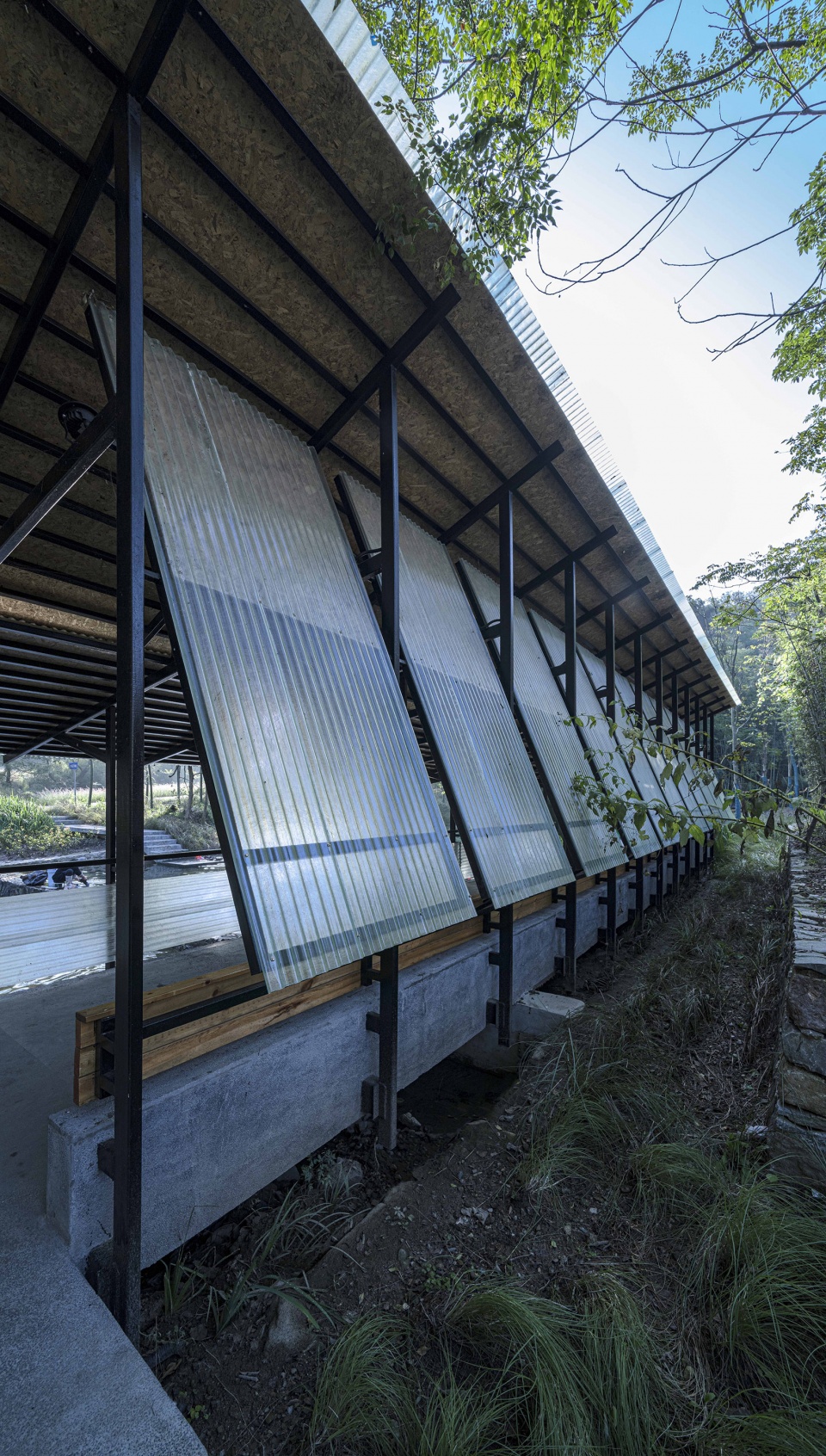 upgrading and renovation of public waterfront space in niujiaochong village huoshan county anhui province by fu yingbin