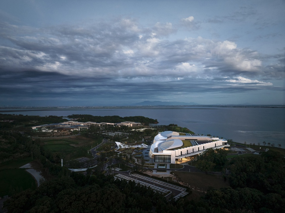 international migratory bird town convention exhibition center by oi architects
